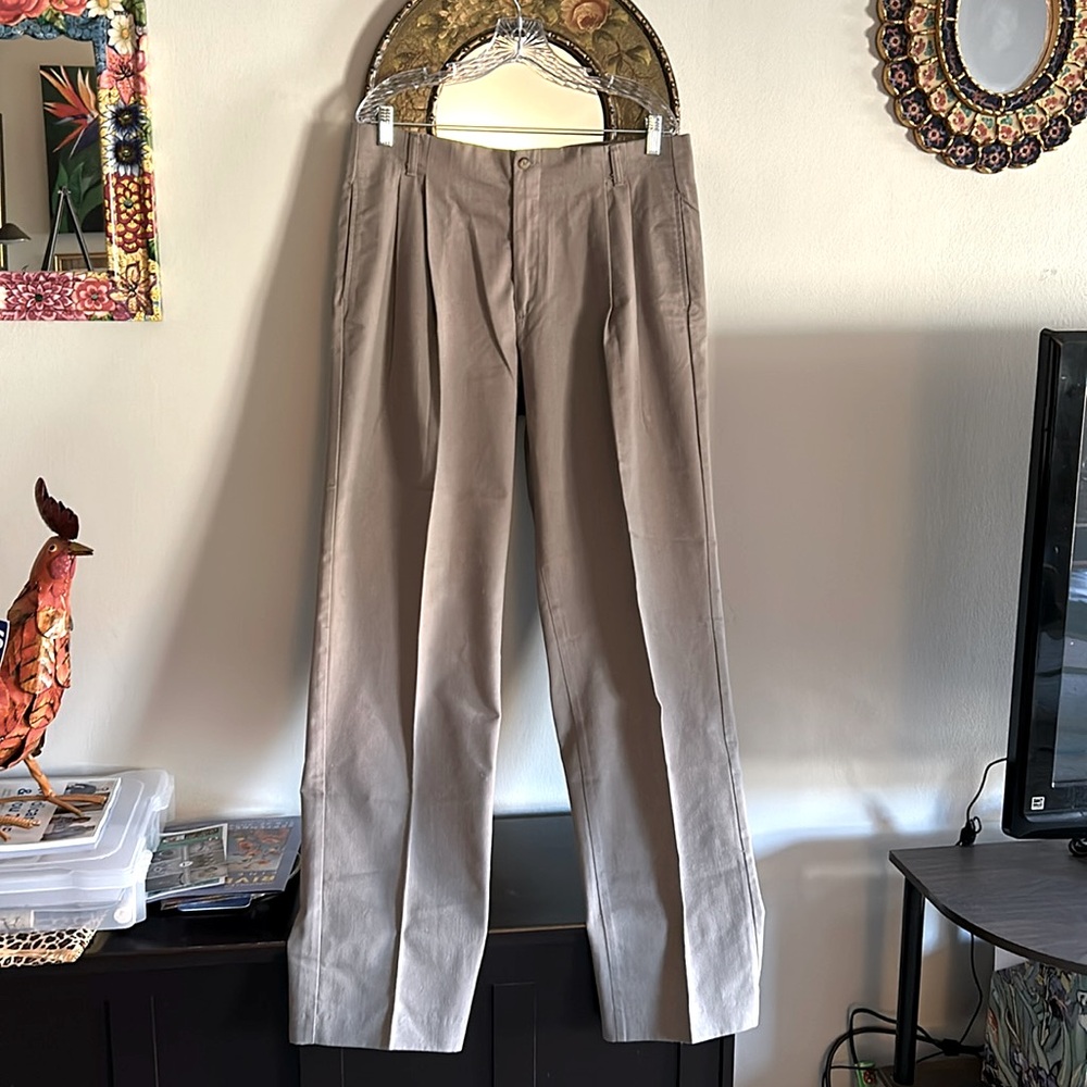Men’s new, never worn khaki slacks.